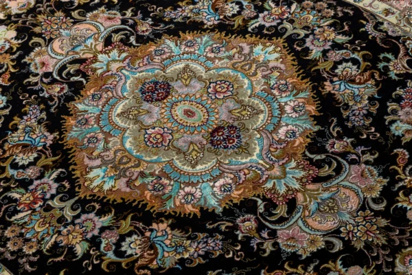 Persian Tabriz Khatibi carpet hand-knotted with floral motif in fine wool and silk, 60 Raj knots, black field