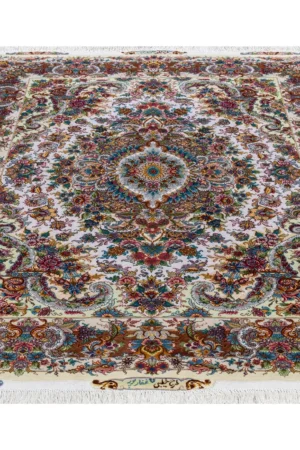 Persian hand-knotted Tabriz carpet with signature Khatibi floral motif, 60 Raj, fine wool and silk, measuring 2.10×1.54m – masterpiece craftsmanship from Iran.