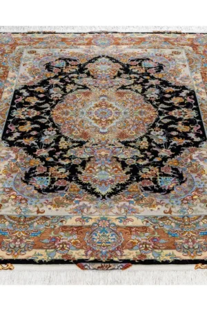 Persian Tabriz rug khatibi design with black medallion field and intricate floral border with silk and fine wool