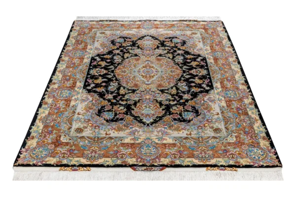 Persian Tabriz rug khatibi design with black medallion field and intricate floral border with silk and fine wool