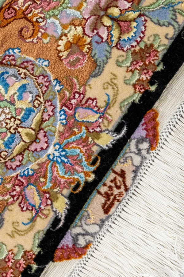 Persian Tabriz rug khatibi design with black medallion field and intricate floral border with silk and fine wool