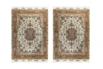 Hand-knotted Persian Khatibi rugs from Mashhad with intricate ivory and gold floral design, crafted in fine wool and silk.