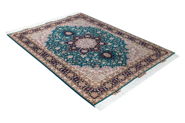 Hand-knotted Persian Heris design carpet from Tabriz, featuring teal green and black medallion pattern with silk-accented floral motifs – 2 x 1.5 meters.