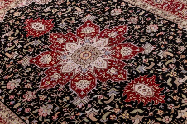 Hand-knotted Heris design Persian rug from Tabriz in black and deep red tones by Parsa Rugs—woven in fine wool with silk.