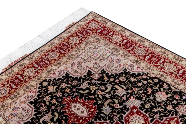 Hand-knotted Heris design Persian rug from Tabriz in black and deep red tones by Parsa Rugs—woven in fine wool with silk.