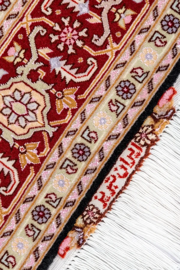 Hand-knotted Heris design Persian rug from Tabriz in black and deep red tones by Parsa Rugs—woven in fine wool with silk.