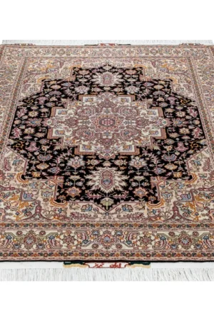 Hand-knotted Tabriz Heris rug in black and ivory with rose and pastel details, fine wool and silk accents, 3 sqm Parsa Rugs.