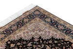 Hand-knotted Persian Tabriz Heris rug in black and cream tones with a central medallion, made of fine wool with silk highlights – 3 sqm, 50 Raj density.