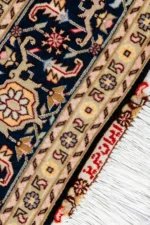 Hand-knotted Persian Tabriz Heris rug in black and cream tones with a central medallion, made of fine wool with silk highlights – 3 sqm, 50 Raj density.