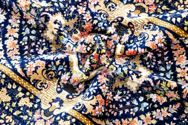 Persian Hand-knotted Qom carpet in 100% natural silk with golden motifs, 80 Raj knots density, and luminous detailing ideal for luxury interiors.