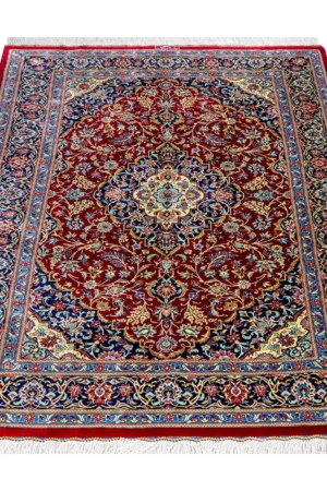 Qom Persian carpet in full natural silk, hand-knotted with 80 Raj , featuring a ruby red field and floral design sold by brand Parsa Rugs