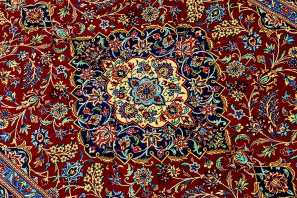 Qom Persian carpet in full natural silk, hand-knotted with 80 Raj , featuring a ruby red field and floral design sold by brand Parsa Rugs