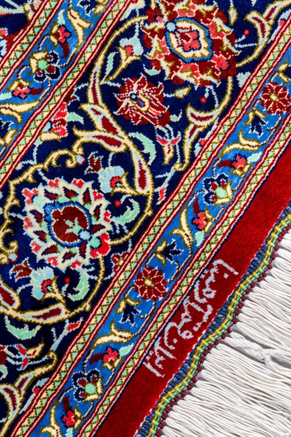 Qom Persian carpet in full natural silk, hand-knotted with 80 Raj , featuring a ruby red field and floral design sold by brand Parsa Rugs