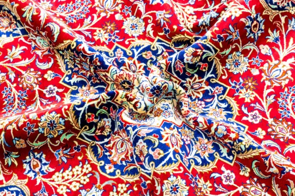 Qom Persian carpet in full natural silk, hand-knotted with 80 Raj , featuring a ruby red field and floral design sold by brand Parsa Rugs