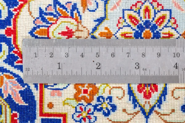 Qom Persian carpet in full natural silk, hand-knotted with 80 Raj , featuring a ruby red field and floral design sold by brand Parsa Rugs