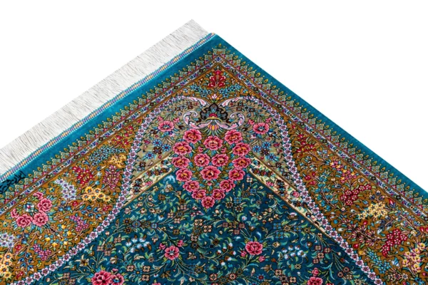 Qom silk carpet in full natural silk, hand-knotted in Iran with 80 Raj density. Features a turquoise floral design with central medallion.